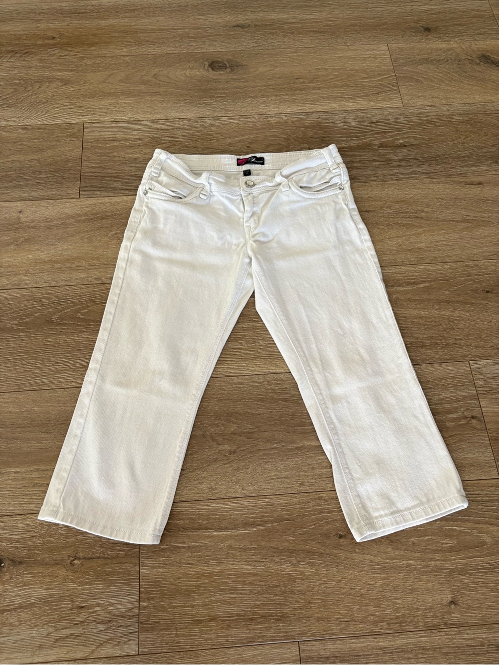 bebe White Denim Jeans with Pink Heart Accent